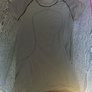 Lululemon swiftly tech. Black striped size 6